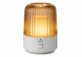 Amber ribbed glass electric aroma diffuser isolated on white background Royalty Free Stock Photo