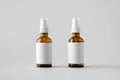 Amber Spray Bottle Mock-Up - Two Bottles. Blank Label