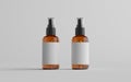 Amber Spray Bottle Mockup - Two Bottles. Blank Label. 3D Illustration