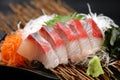 Amberjack sashimi plate on a dining table Royalty Free Stock Photo