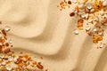 Ambers And Seashells On Sand Background Royalty Free Stock Photo