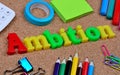 Ambition word on cork background