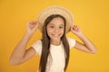 Ambitious and beautiful. she loves vintage. teen girl summer fashion. little beauty in straw hat. beach style for kids