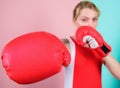 Ambitious girl fight boxing gloves. Female rights. I am gonna kick you off. Confident in her boxing skill. Boxing