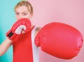 Ambitious girl fight boxing gloves. Female rights. I am gonna kick you off. Confident in her boxing skill. Boxing