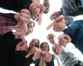 ambitious young people standing in a circle and pointing at you. Royalty Free Stock Photo