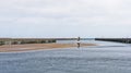 Amble harbour, Northumberland, UK at low tide with seabirds Royalty Free Stock Photo