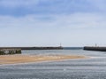 Amble harbour, Northumberland, UK at low tide with seabirds Royalty Free Stock Photo