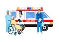 Paramedics assist a patient in an ambulance