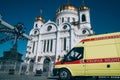 Ambulance on the background of the temple of Christ the Savior in Moscow