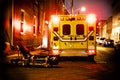 An ambulance car parked on the side street at night Royalty Free Stock Photo