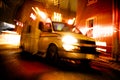 An ambulance car parked on the side street at night Royalty Free Stock Photo