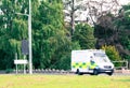 Ambulance in the city on a blurred background . Intentional motion blur