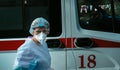 Ambulance doctor in protective mask and clothes from coronavirus