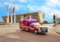 Ambulance in front of Dallas City Hall with American, Texas, and City of Dallas Flags Royalty Free Stock Photo