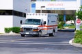 Ambulance leaving hospital after emergency Royalty Free Stock Photo