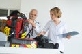 Ambulance man and woman checking gear between interventions Royalty Free Stock Photo
