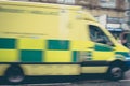 Ambulance speeding to accident - abstract motion blur shot Royalty Free Stock Photo