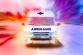 Ambulance speeding to accident first aid abstract motion blur shot. Royalty Free Stock Photo