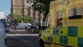 An ambulance speeds through Parliament Square