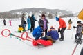 The ambulance staff provided first aid to the injured skier at a Royalty Free Stock Photo