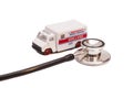 Ambulance toy car and Stethoscope Royalty Free Stock Photo