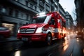 Ambulance van in high speed motion driving down city street Royalty Free Stock Photo