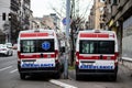 Ambulance vehicle on the street, with Police in background, securing public event in Belgrade