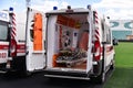 Ambulances stand at the stadium during the day Royalty Free Stock Photo
