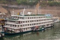 Ambulant vendor on side of passenger boat on Yangtze river, Baidicheng, China