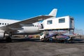 Ambulift truck for people with disabilities is at the passenger airplane