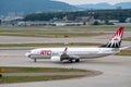 AMC charter airlines airplanes preparing for take-off at day time in international airport