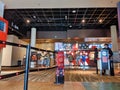 AMC movie theater foyer with ticket stand and refreshment counter.