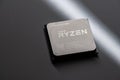 AMD Ryzen 5 CPU processor on grey background.. Royalty Free Stock Photo