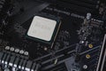 AMD Ryzen 5 3600 Processor close up in the X570 motherboard socket. New Zen 2, 7 nanometer desktop processor by AMD.