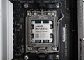 AMD Ryzen 9 7950X3D processor close-up installed in motherboard socket. Studio shot. Royalty Free Stock Photo