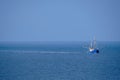 Ameland, Netherlands-April,19,2021: Fishing boat, nets and seagulls on the Wadden Sea. Fisherman conflict escalates Royalty Free Stock Photo