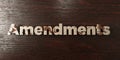 Amendments - grungy wooden headline on Maple - 3D rendered royalty free stock image