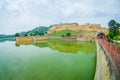 Amer, India - September 19, 2017: Unidentified people walking and enjoying the view of Maota Lake in Amber Fort in