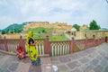 Amer, India - September 19, 2017: Unidentified women walking and enjoying the view of Maota Lake in Amber Fort in Jaipur