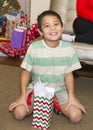 An Amerasian boy smiling at Christmas