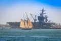 Schooner CALIFORNIAN and USS Carl Vinson CVN-70 Royalty Free Stock Photo