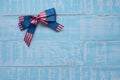 America ribbon on blue wood background Royalty Free Stock Photo