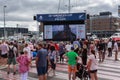 People watching America`s Cup racing on giant outdoor screen, Auckland, New Zealand