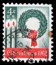 America`s first Christmas postage stamp shows a wreath and candles