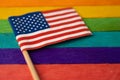 America USA flag on rainbow background symbol of LGBT gay pride month social movement rainbow flag is a symbol of lesbian, gay,