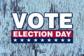 America vote election day graphic with white text and stars red box with faded blue woo