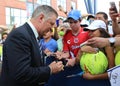 American actor, producer, and comedian Alec Baldwin signing autographs at the red carpet before US Open 2015