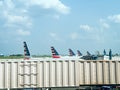 American Airlines airplane tails beyond a jet bridge at Denver International Airport in Colorado Royalty Free Stock Photo