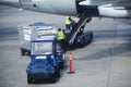 American Airlines baggage handlers uploading luggage at Miami International Airport Royalty Free Stock Photo